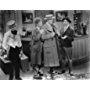 Chico Marx, Harpo Marx, and Oscar Shaw in The Cocoanuts (1929)