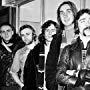 Phil Collins, Tony Banks, Peter Gabriel, Mike Rutherford, Steve Hackett, and Genesis