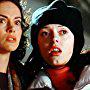 Rose McGowan and Joanna Going in Phantoms (1998)