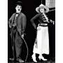 Charles Chaplin and Edna Purviance in The Bond (1918)