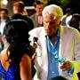 Still of TV show The Good Place with Actors Tiya Sircar and Ted Danson.