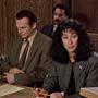 Cher and Liam Neeson in Suspect (1987)