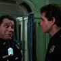 Steve Guttenberg and Art Metrano in Police Academy 2: Their First Assignment (1985)