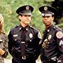 Sharon Stone, Steve Guttenberg, and Michael Winslow in Police Academy 4: Citizens on Patrol (1987)