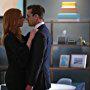 Gabriel Macht and Sarah Rafferty in Suits (2011)