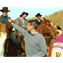 Tiago preparing to shoot a scene in a western feature film set.