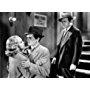 Claude Rains, John Garfield, and Gloria Dickson in They Made Me a Criminal (1939)