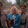 Robin Bailey, Kirsten Hughes, Sam J. Jones, and Graham Stark in Jane and the Lost City (1987)