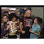 Billy Crystal, Julia Louis-Dreyfus, and Jim Belushi in Saturday Night Live (1975)