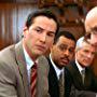 Keanu Reeves, Ruben Santiago-Hudson, and George Wyner in The Devil