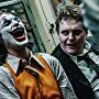 Joaquin Phoenix and Ben Warheit in Joker (2019)