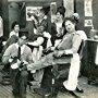 James T. Kelley, Harold Lloyd, and Gene Marsh in Close-Cropped Clippings (1915)