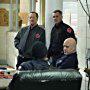 David Eigenberg, Randy Flagler, Christian Stolte, and Anthony Ferraris in Chicago Fire (2012)