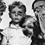Arthur Lake, Larry Simms, Penny Singleton, and Daisy in Blondie Brings Up Baby (1939)