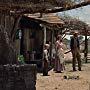 John Wayne, Lee Aaker, and Geraldine Page in Hondo (1953)