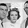 Walter Pidgeon, Florence Rice, and Joseph Schildkraut in Phantom Raiders (1940)