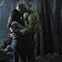 Derek Mears and Crystal Reed in Swamp Thing (2019)