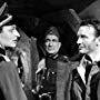 Anton Diffring, John Mills, and Ernie Rice in The Colditz Story (1955)