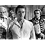 Kirk Douglas, Laurence Olivier, Harry Andrews, and Brian Oulton in The Devil