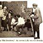 Eddie Barry, Archie Mayo, Robert McKenzie, and Gladys Varden in The Kid Snatchers (1917)