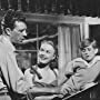 Dan Dailey, Billy Gray, and June Haver in The Girl Next Door (1953)