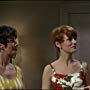 Walter Matthau, Monica Evans, and Carole Shelley in The Odd Couple (1968)