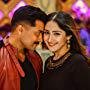 Suriya and Sayyeshaa Saigal in Kaappaan (2019)